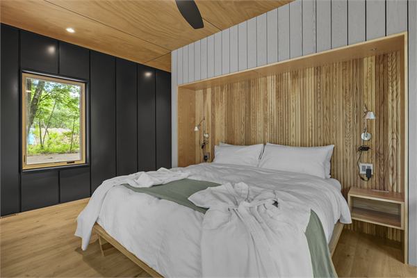 The Pines king bedroom with floor-to-ceiling windows
