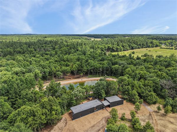 Aerial view of The Ridge and Oak and Ember wooded acreage
