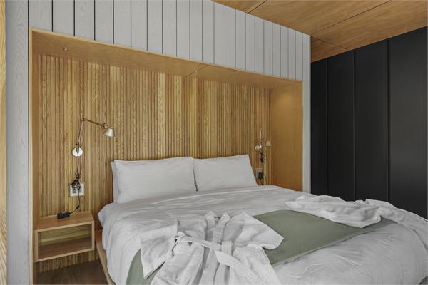 The Ridge king bedroom with wooded views