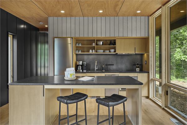 The Ridge kitchen with island seating and wood cabinetry