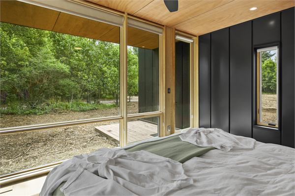 The Ridge king bedroom with wooded views