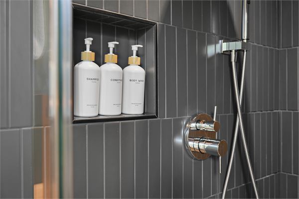 The Ridge walk-in shower with dark tile