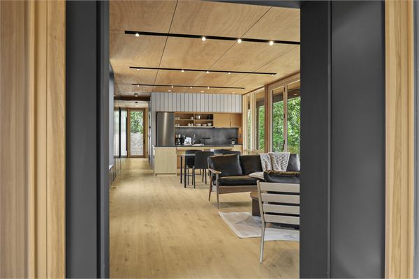 The Ridge living area with wooded views