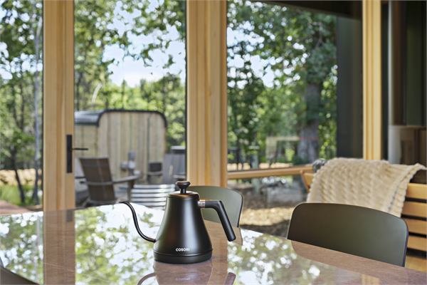 The Ridge living area with wooded views